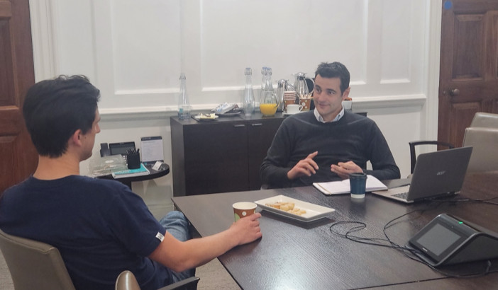 Men at a table Men at a table